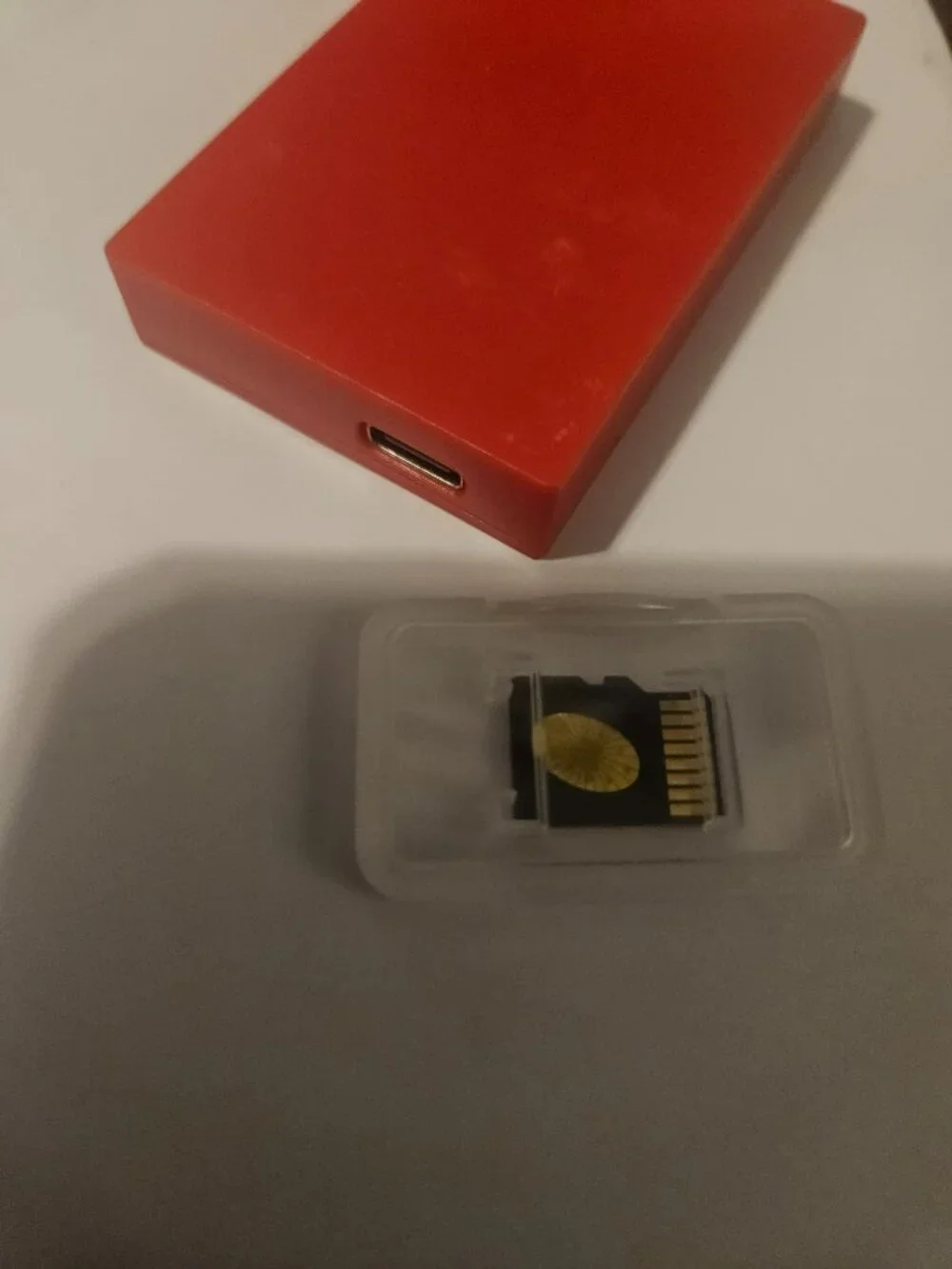 Nintendo Switch Mig Dumper with a memory card in a case